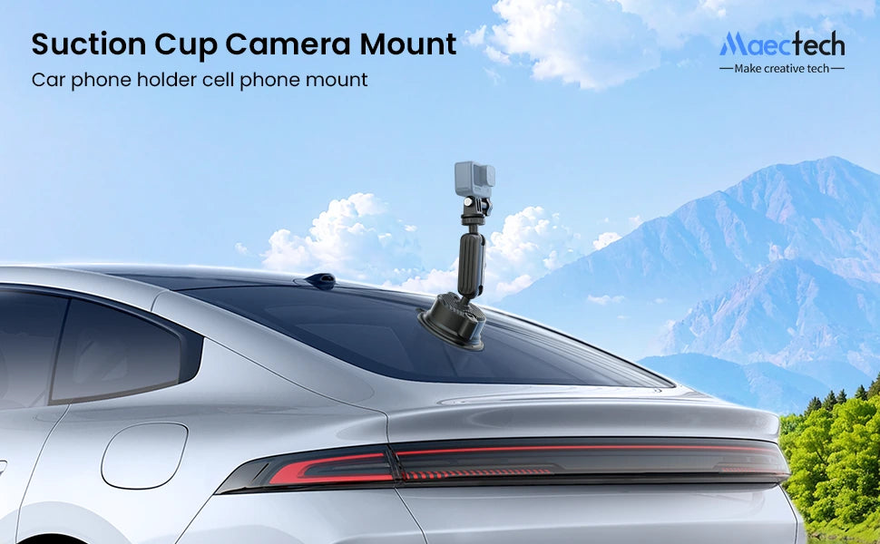 Suction cup camera mount on a car with a scenic background