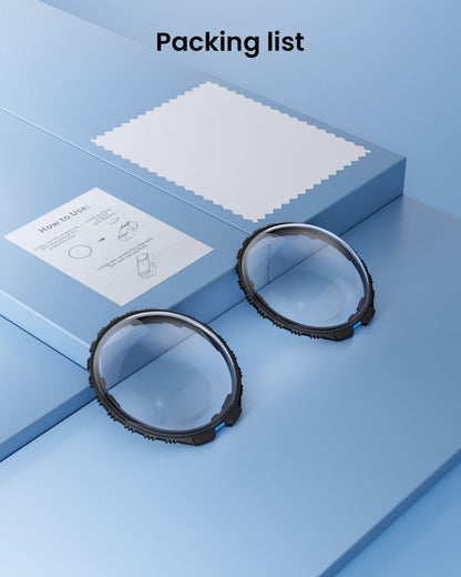 Two Maectech black circular filters on a blue surface with a box and paper in the background.