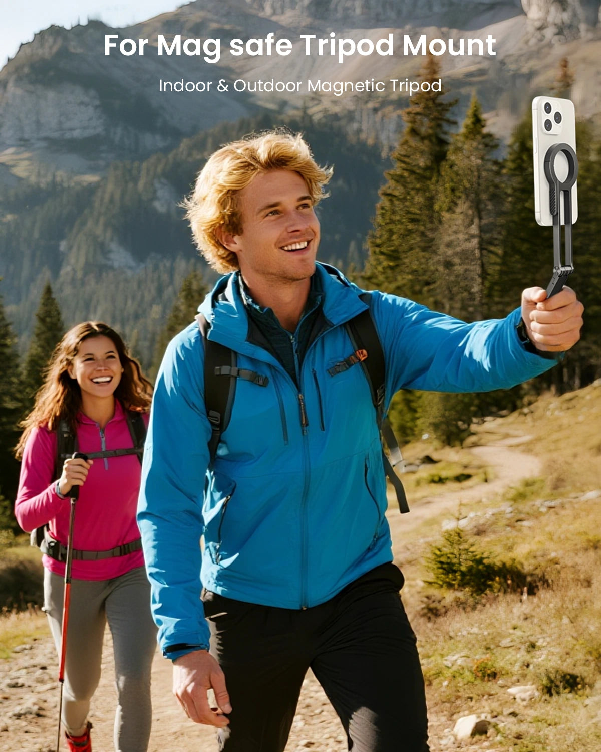 Man and woman hiking in a mountainous area with a magnetic tripod mount.