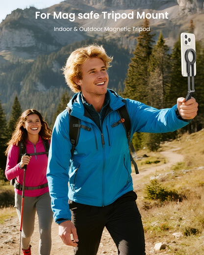 Man and woman hiking in a mountainous area with a magnetic tripod mount.