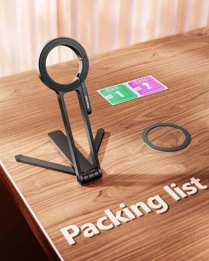 Black metal stand on a wooden surface with 'Packing list' text