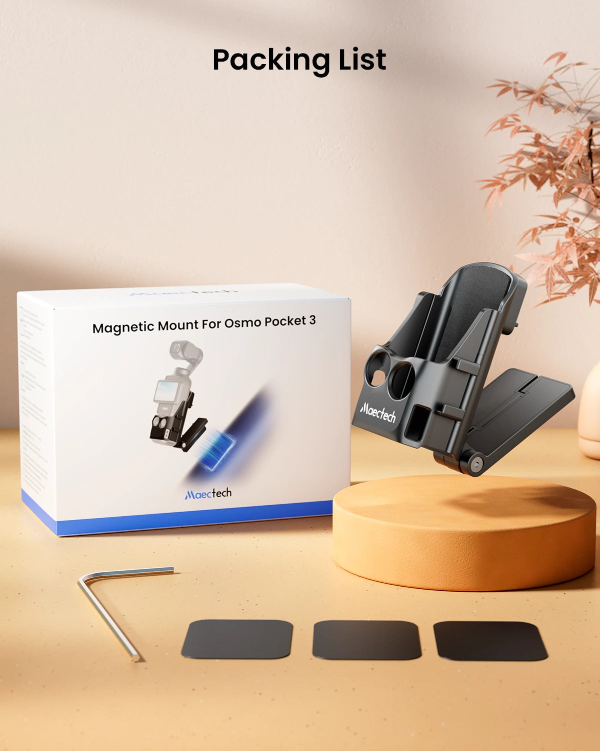 Magnetic mount for Osmo Pocket 3 with packaging and accessories on a wood-colored surface.